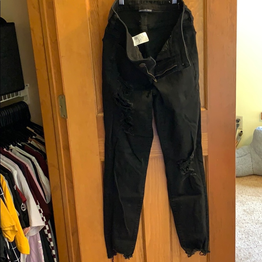 American Eagle black distressed jeggings